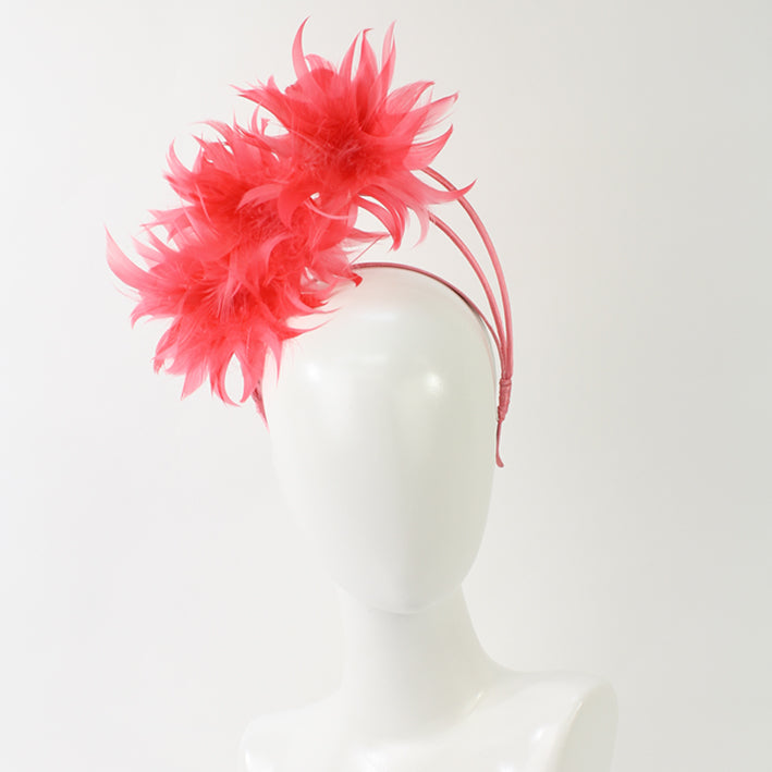 Jendi Feather Arches Fascinator in Coral on a Headband